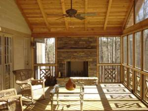 Outdoor fireplace on screened porch